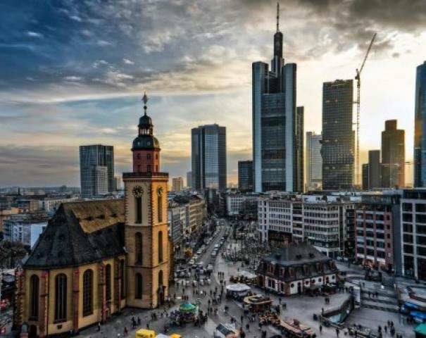 city view with office towers and church