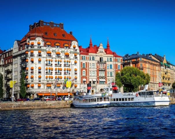 hotel and boats along quay