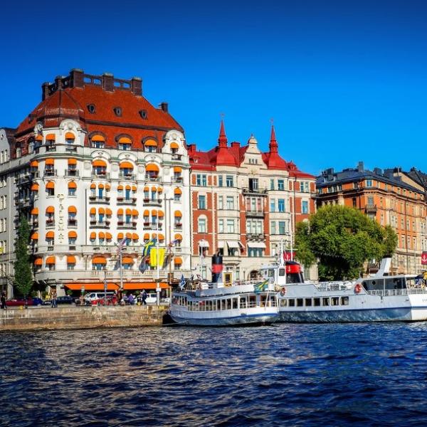 hotel and boats along quay